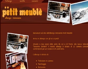 Petit Meubl, right next to the lifts, 5 mins to the resort centre - walk out, ski back.